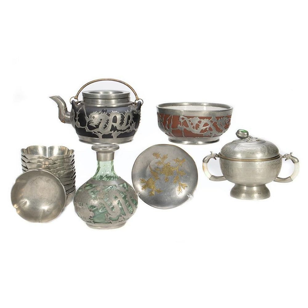 Appraisal: Chinese Pewter Collection Including twelve soup bowls Tea pot and