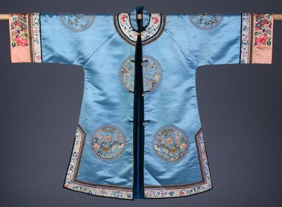 Appraisal: CHINESE EMBROIDERED BLUE SILK COAT Qing dynasty Worked with Peking