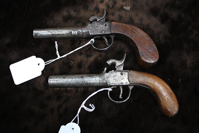 Appraisal: TWO GEORGIAN PERCUSSION POCKET PISTOLS each with walnut butts cm