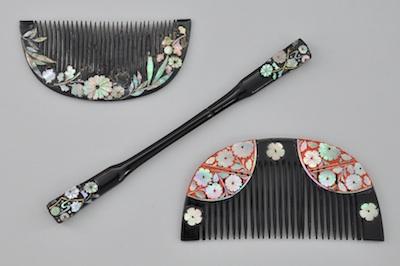 Appraisal: Three Japanese Hair Ornaments Consisting of a black lacquer finish