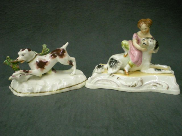 Appraisal: Staffordshire figure depicting young girl with black and white dog