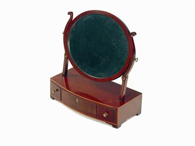 Appraisal: A th century mahogany dressing table mirror the oval plate