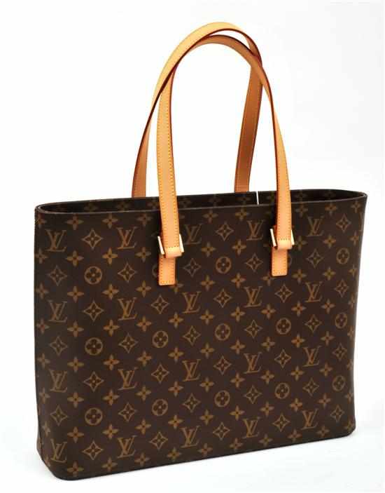 Appraisal: A LUCO HANDBAG BY LOUIS VUITTON Styled in monogram canvas