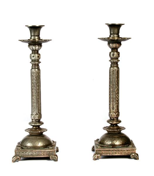 Appraisal: A pair of Oscar Bach silvered bronze candlesticks circa each