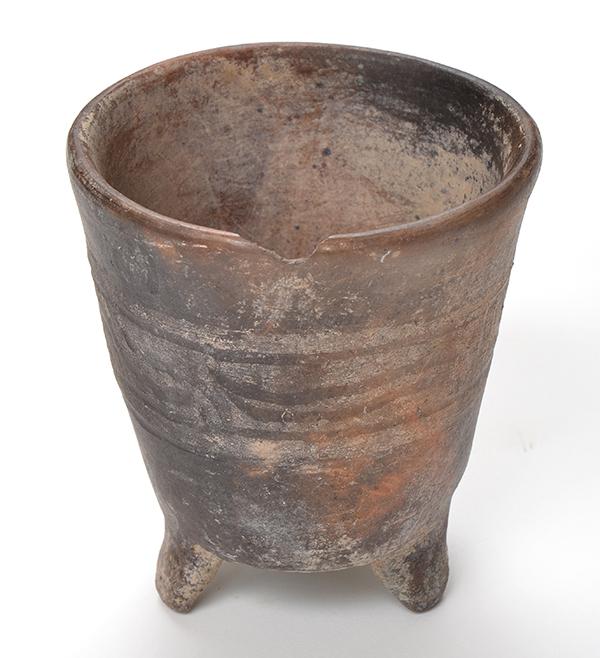 Appraisal: AN ANCIENT NEAR-EASTERN EARTHENWARE TRIPOD VESSEL CIRCA LATE SECOND MILLENIUM