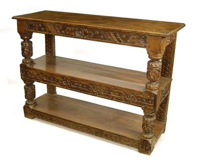 Appraisal: A carved oak three tier cup-board in Elizabethan style in