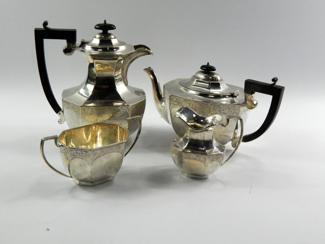 Appraisal: A George V silver tea service of octagonal form with