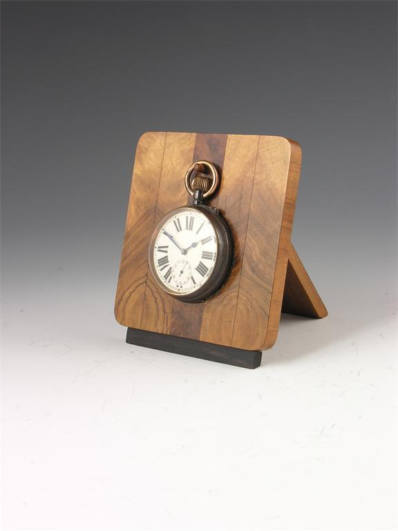 Appraisal: An Art Deco walnut and ebonised watch stand