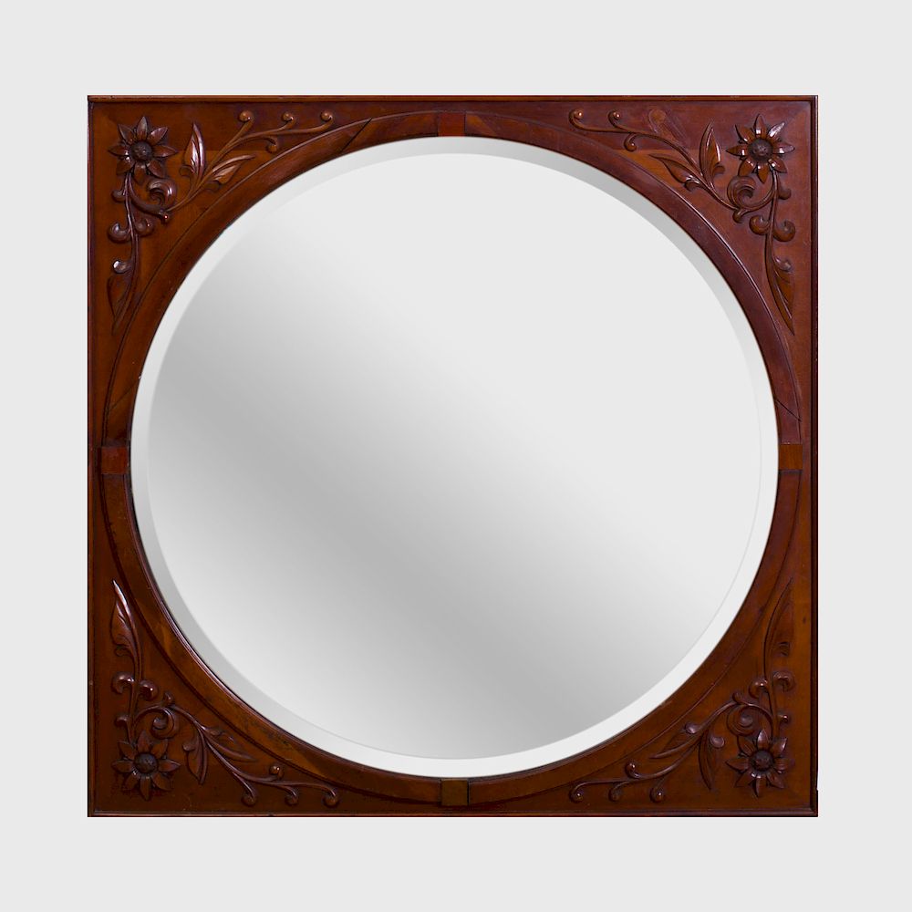 Appraisal: Continental Carved Mahogany Mirror Modern Fitted with a bevelled mirror