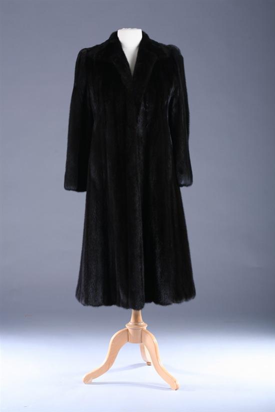 Appraisal: LADY'S BLACK MINK FUR CALF-LENGTH COAT Gartenhaus label Embroidered black