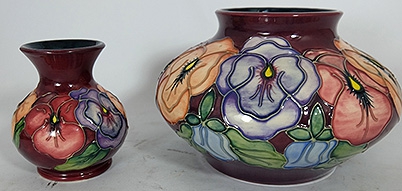 Appraisal: Moorcroft vases decorated in the Pansy design tallest height cm