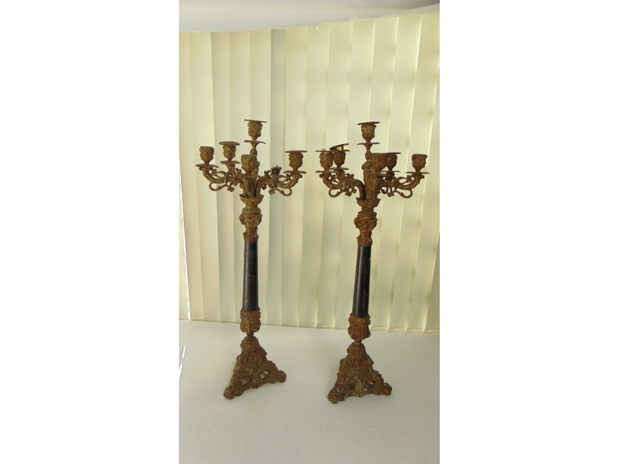 Appraisal: A pair of six branch spelter floor standing candelabra with