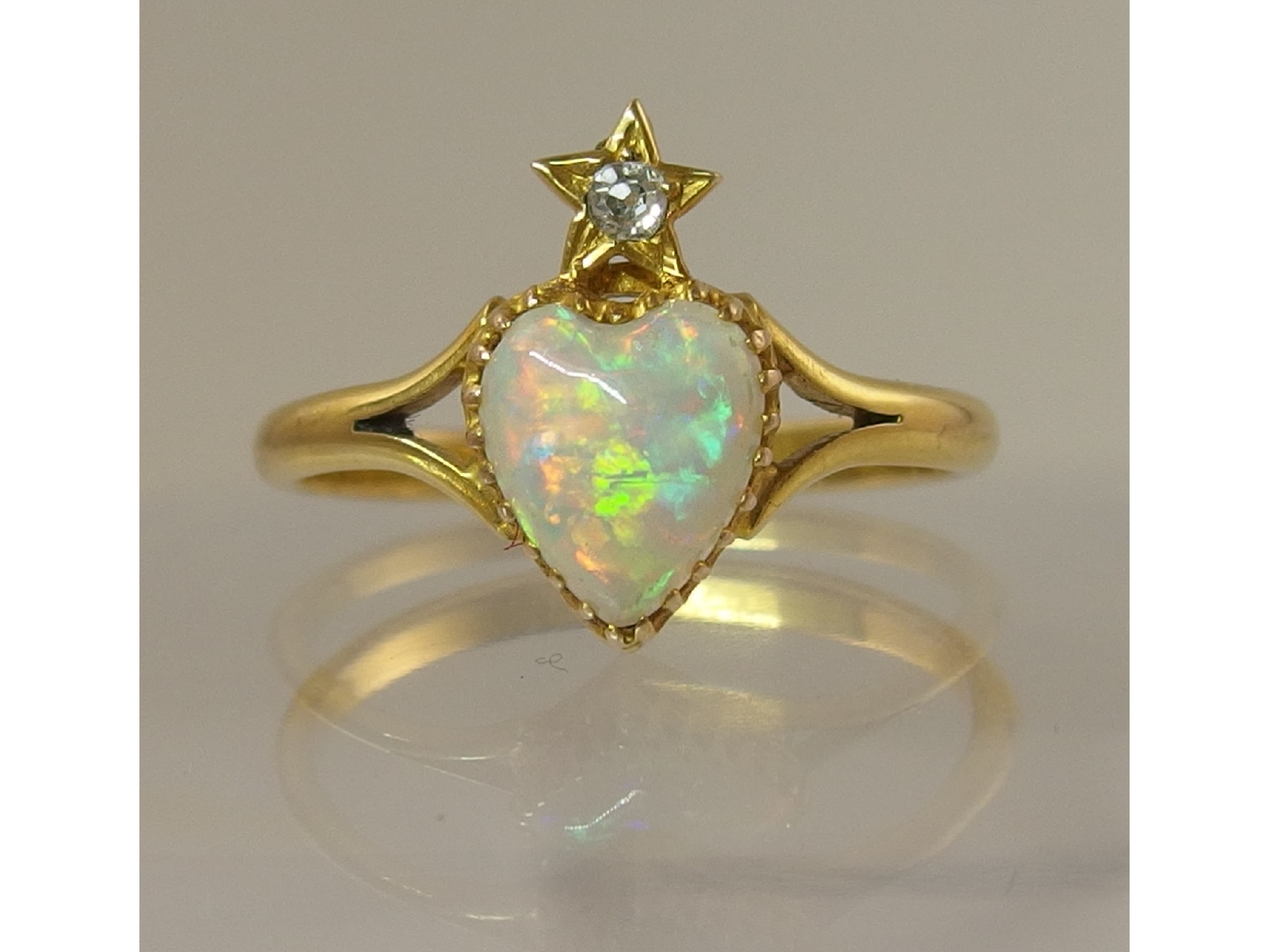 Appraisal: A Victorian heart shaped opal and diamond star ringthe opal