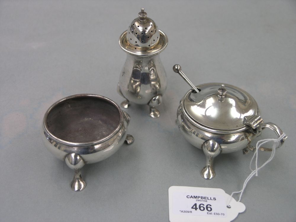 Appraisal: A silver condiment trio mustard pot with liner salt and