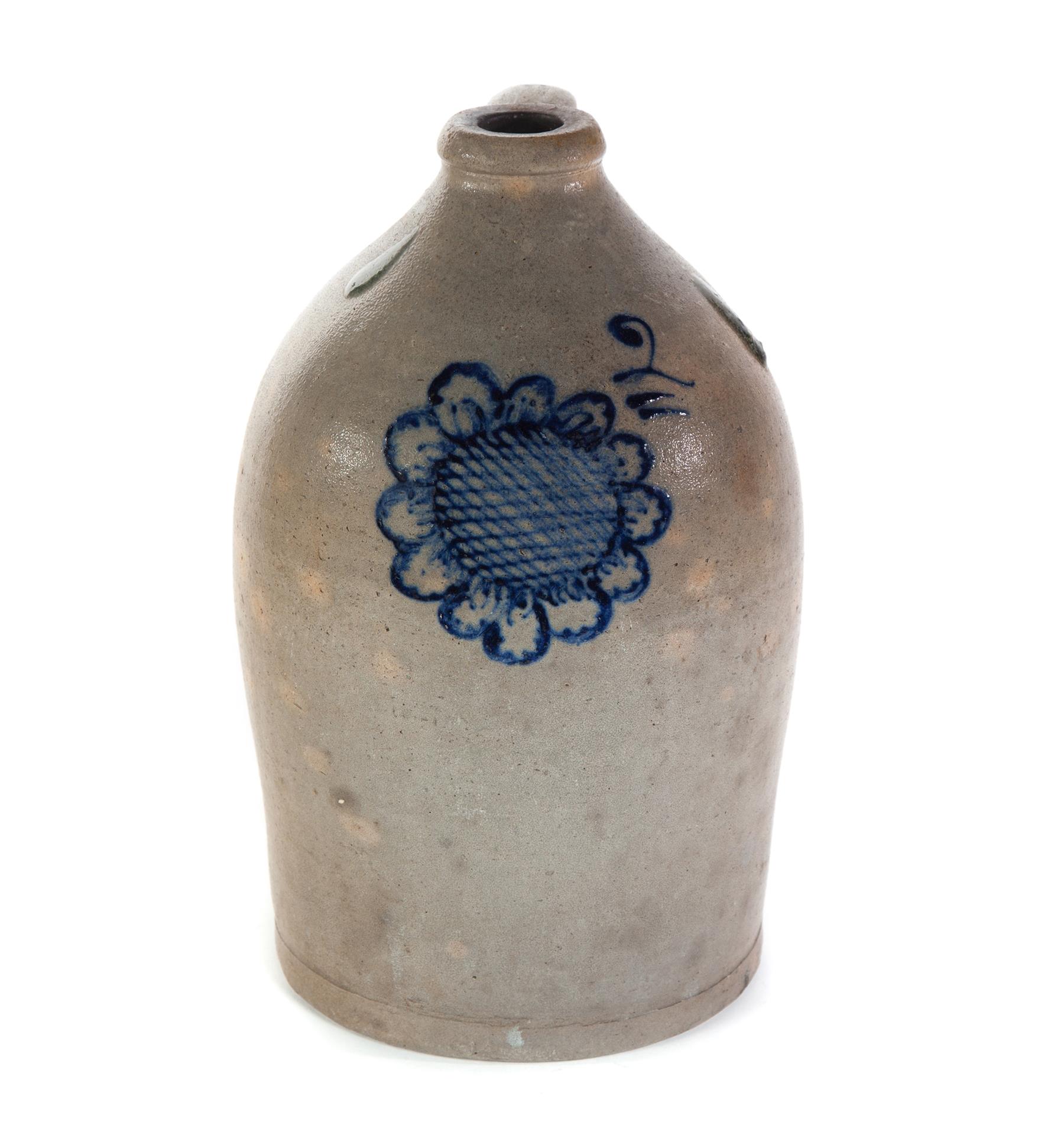 Appraisal: AMERICAN STONEWARE JUG Second half- th century Brushed cobalt sunflower