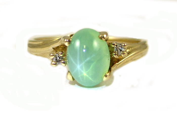 Appraisal: LINDE GREEN STAR SAPPHIRE AND DIAMOND RING The k yellow