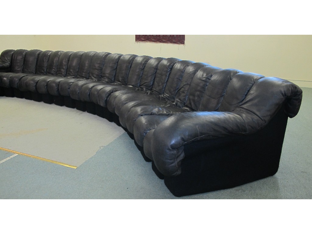 Appraisal: A De Sede black leather snake settee comprising five section