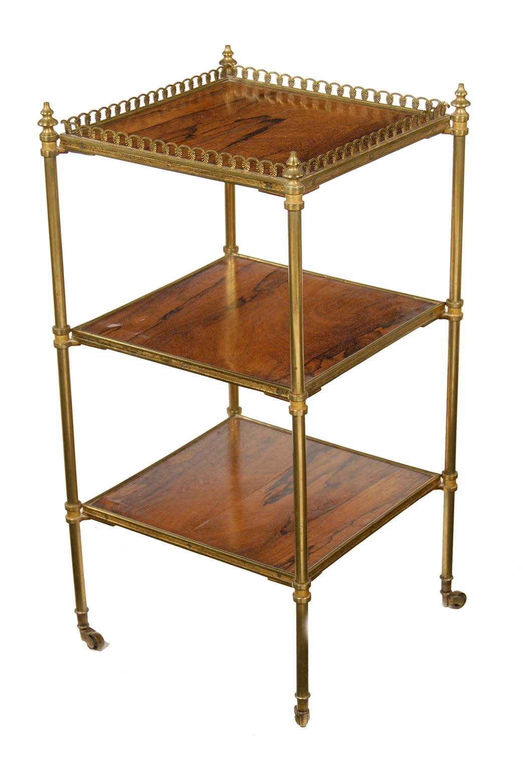 Appraisal: A late th century rosewood and gilt brass three tier