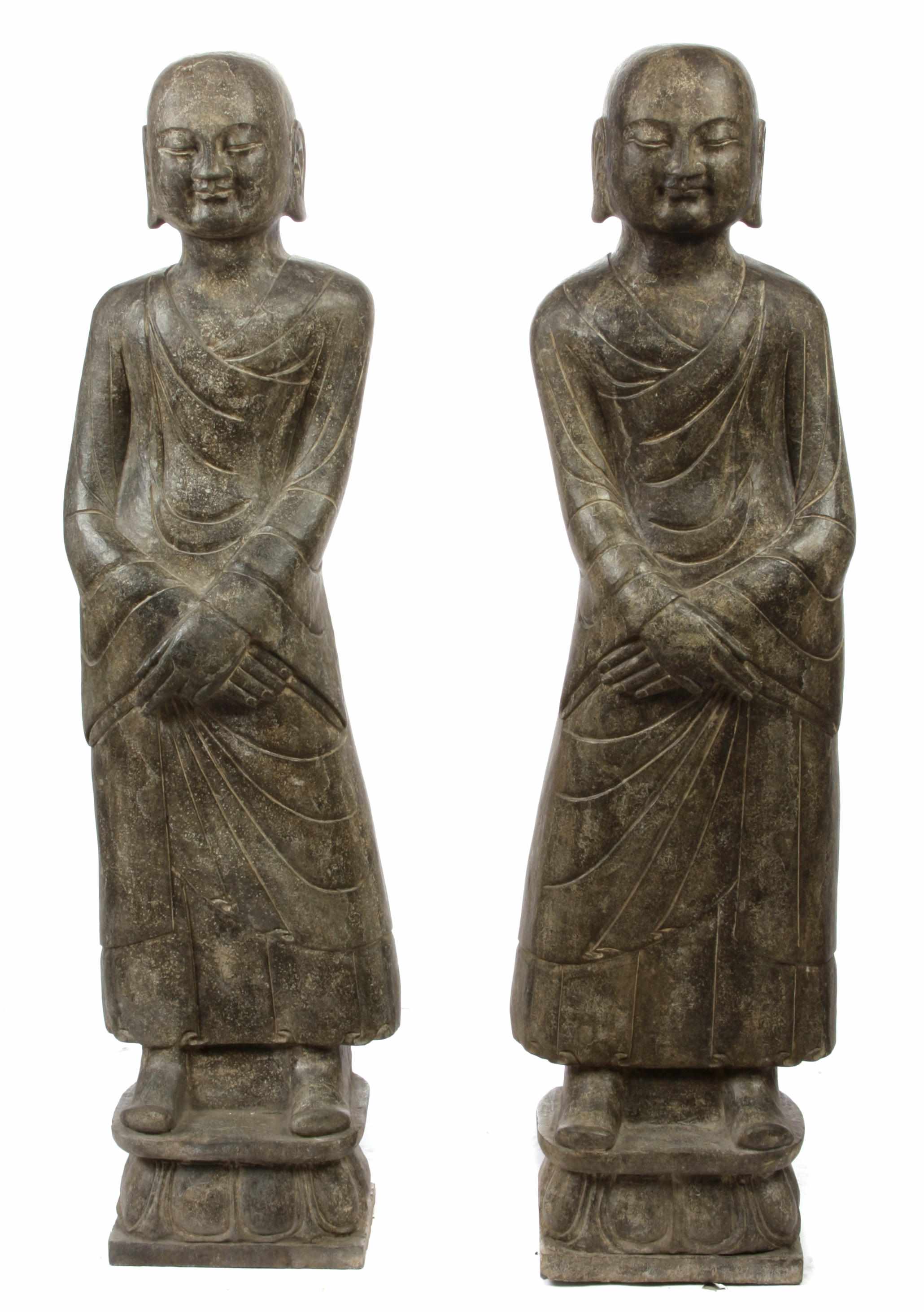 Appraisal: A large pair of Chinese carved stone figures height in