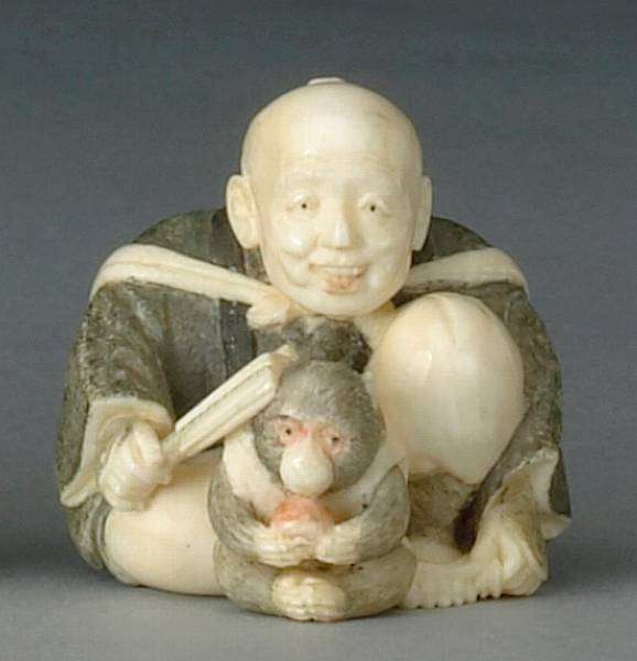 Appraisal: A polychromed ivory study of a monkey trainer th Century