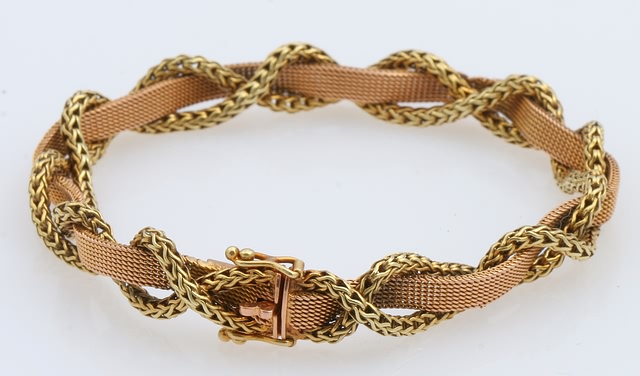 Appraisal: KRose gold mesh and yellow gold braided rope Shows signs