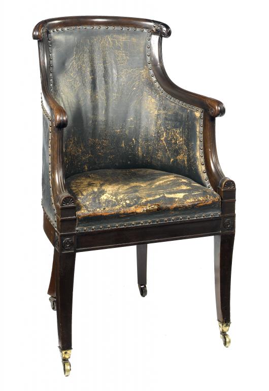 Appraisal: A WILLIAM IV MAHOGANY BERGERE with lotus carved terminals to