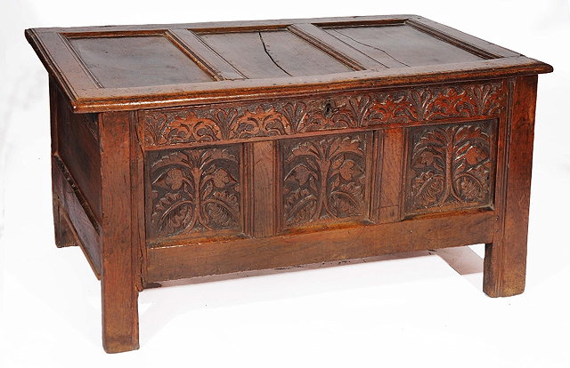 Appraisal: A TH CENTURY OAK COFFER with triple panelled top and