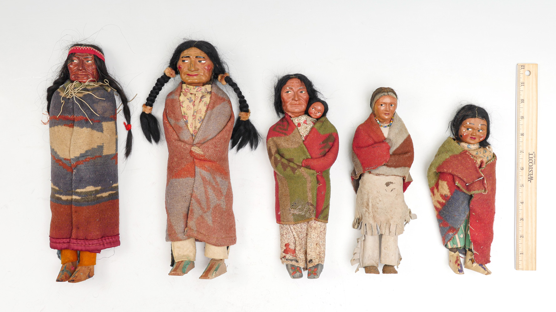 Appraisal: VINTAGE AMERICAN INDIAN SKOOKUM DOLLS Skookum Doll is approx ''