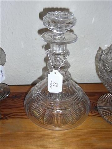 Appraisal: A HEAVY CUT GLASS SHIPS DECANTER and a stopper with