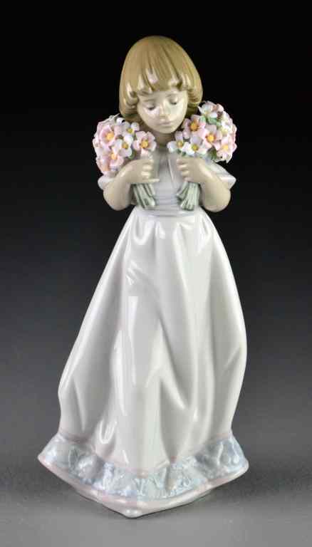 Appraisal: Lladro Porcelain Figurine ''Girl with Flowers''''Ramos de Primavera'' depicting a