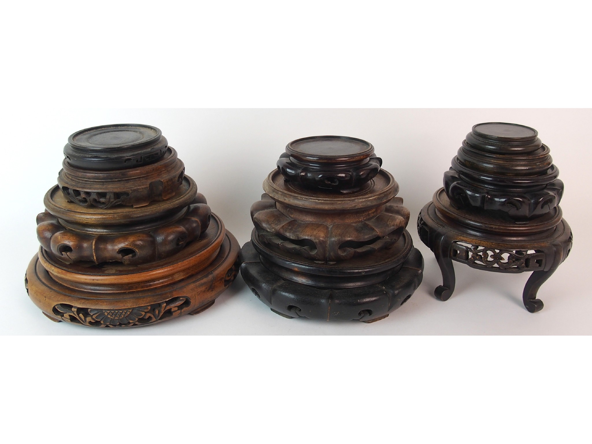 Appraisal: Eleven Chinese wood standsvarious sizes cm diameter largest cm diameter