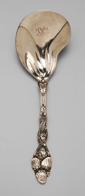 Appraisal: Tiffany sterling berry spoon oyster-shaped bowl with openwork strawberry-decorated handle