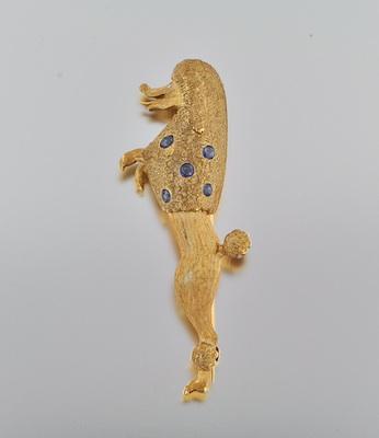 Appraisal: A Gold and Sapphire Poodle Brooch k yellow gold brooch