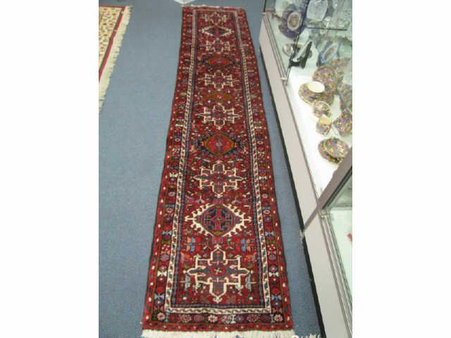 Appraisal: Heriz Persian Handmade Runner medallions on rich red field floral