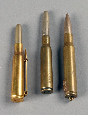 Appraisal: Spanish-American War souvenir bullet and WWI souvenir bullet is a