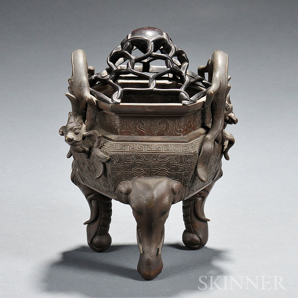 Appraisal: Tripod Bronze Censer China hexagonal with two openwork chilong handles