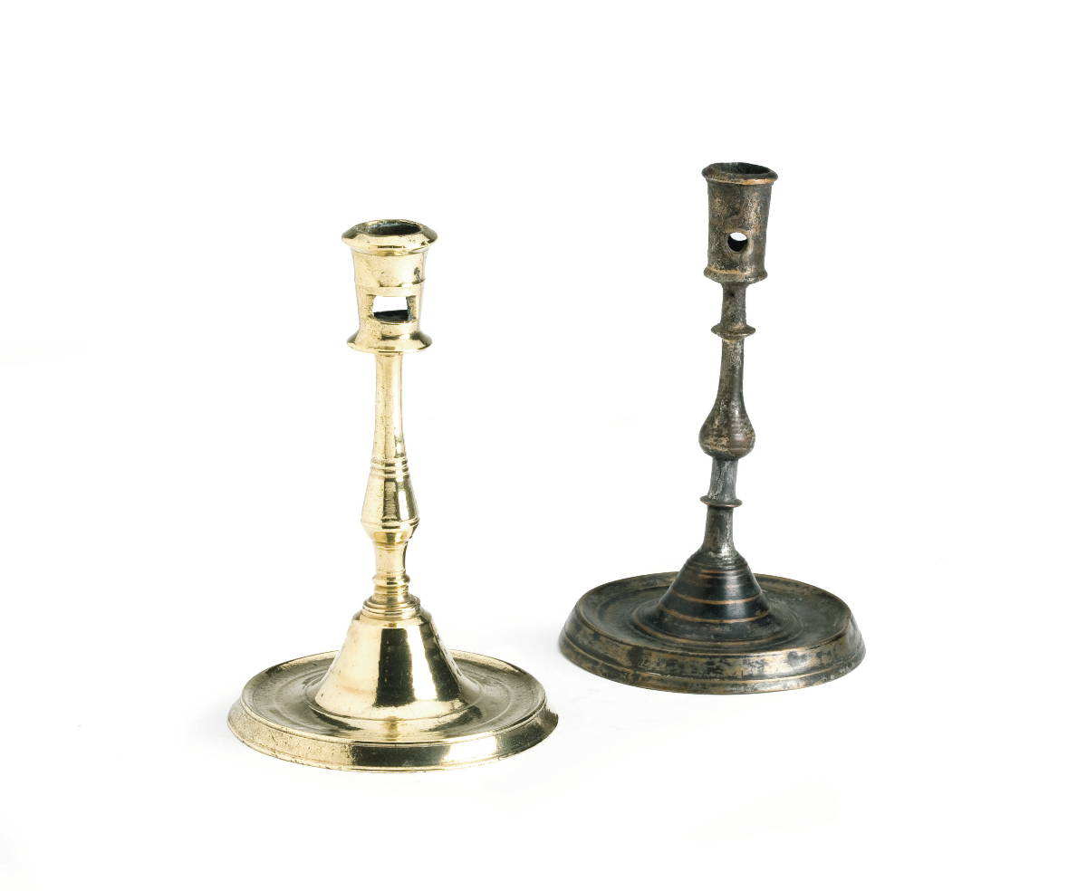 Appraisal: TWO FLEMISH LOW BASED GOTHIC CANDLESTICKS ONE WITH UNUSUAL SILVERED