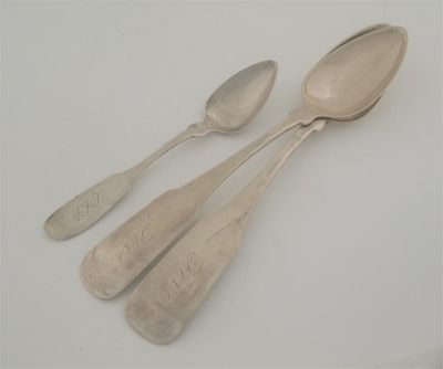 Appraisal: American a pair of 'coin' tablespoons initialled by G Wilson