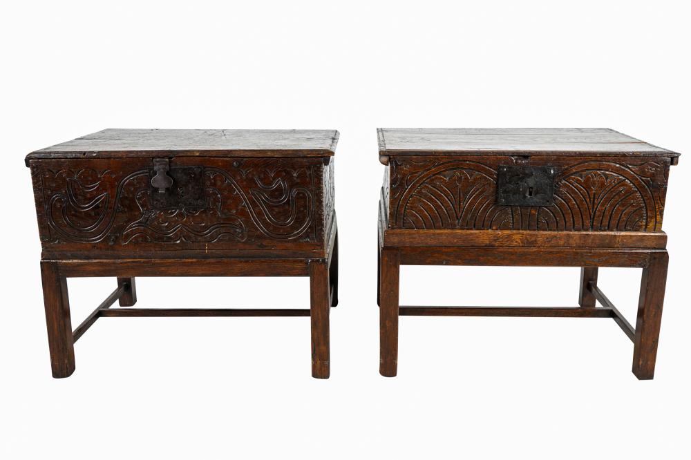 Appraisal: TWO JACOBEAN CARVED OAK TRUNKSwith iron hardware each attached to