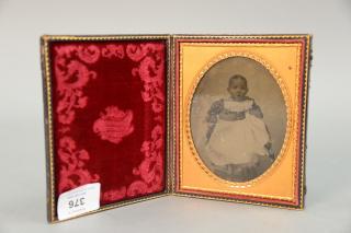 Appraisal: Half plate ambrotype of baby Half plate ambrotype of baby