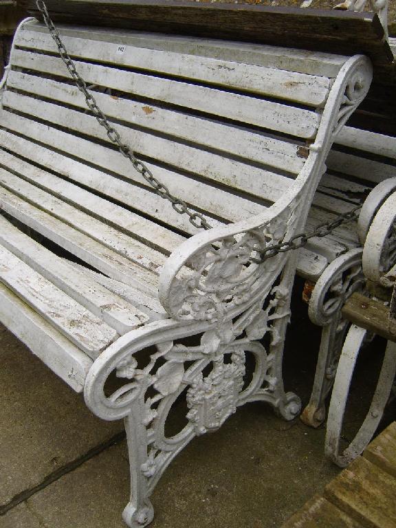 Appraisal: A pair of Victorian cast iron garden benches with decorative