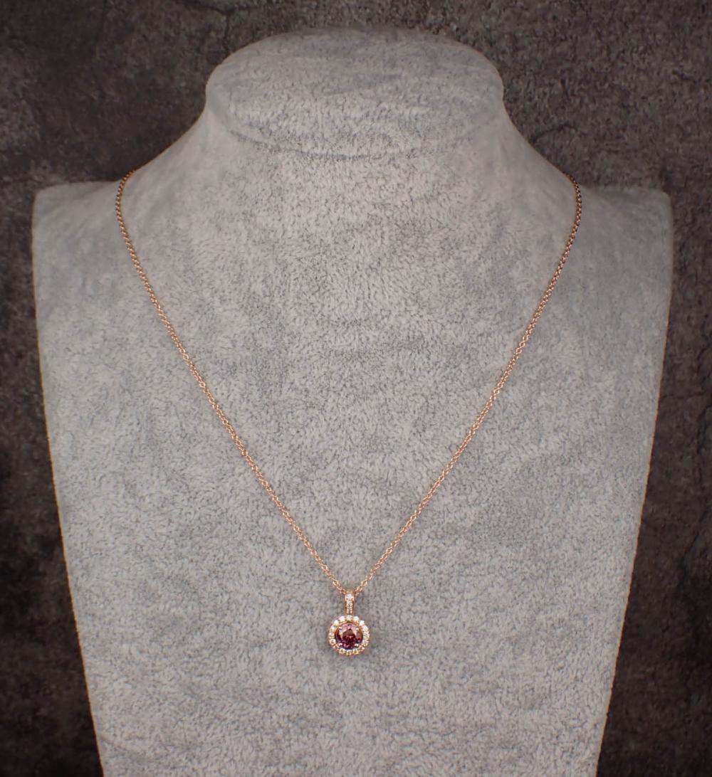 Appraisal: FANCY PURPLISH RED DIAMOND PENDANT NECKLACE with a k rose