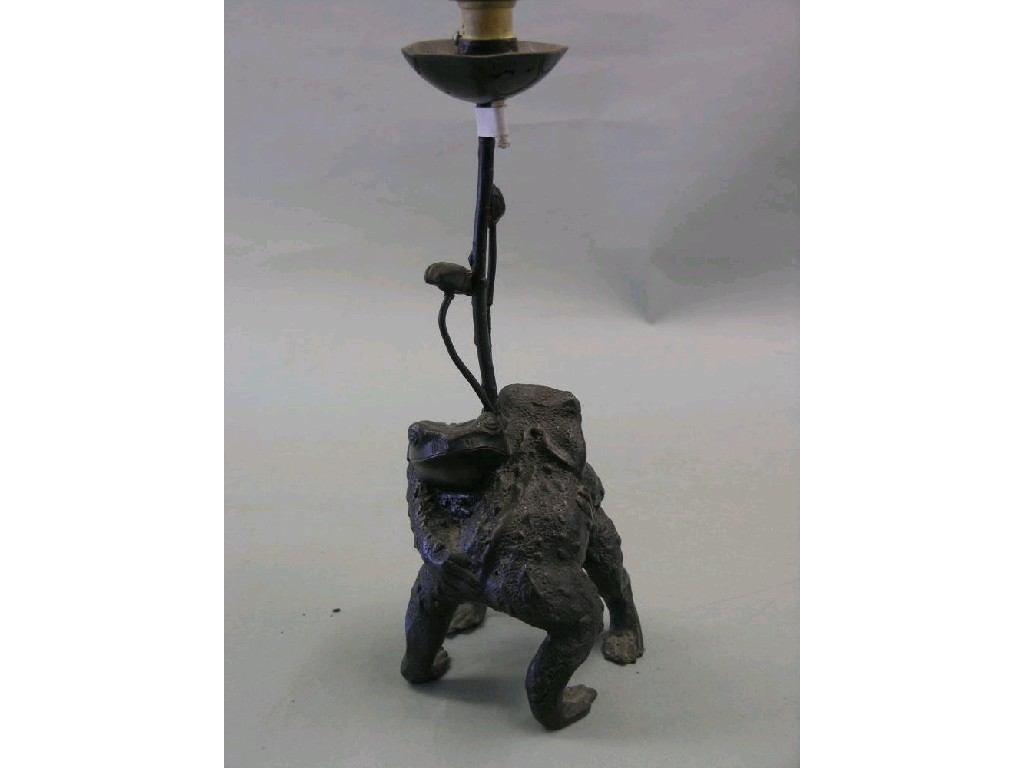 Appraisal: A bronze model of two embracing frogs converted to electric