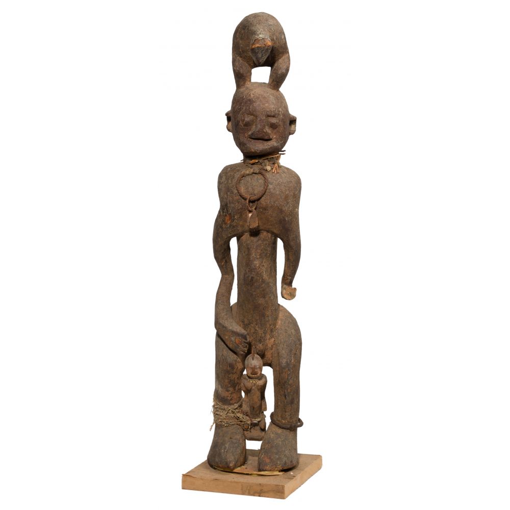 Appraisal: AFRICAN DOGON BAMBARA CARVED WOOD FIGUREDepicting female with child tied