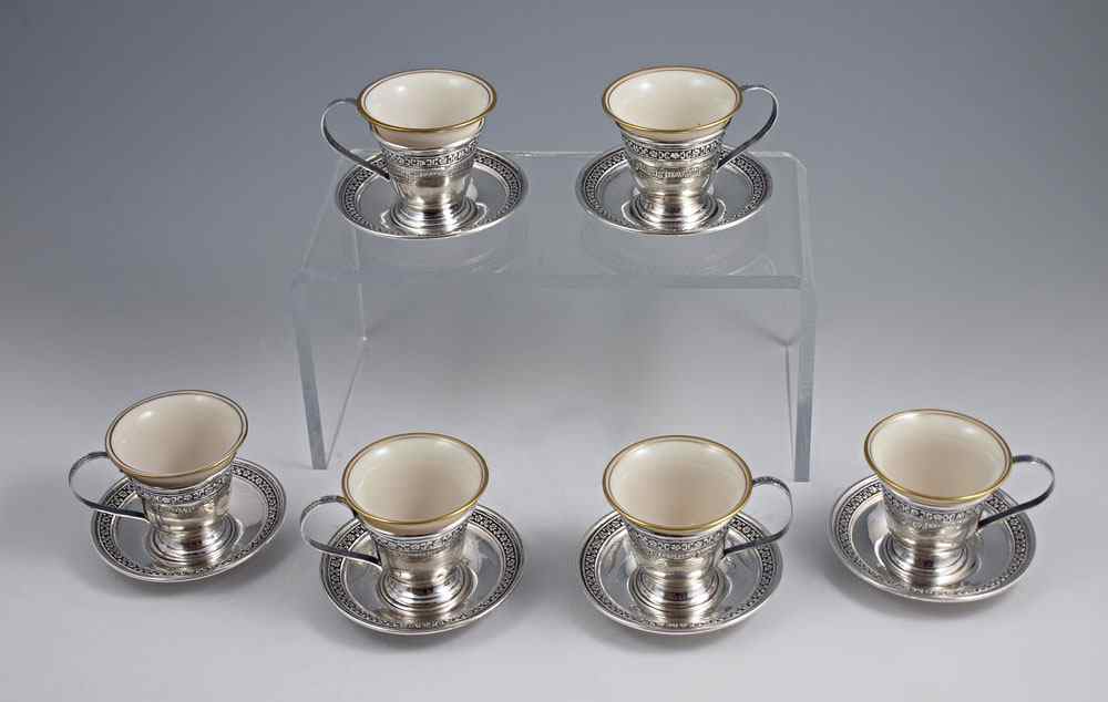 Appraisal: SET OF LENOX AND STERLING DEMITASSE CUPS Unmarked sterling and