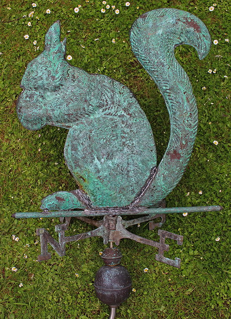 Appraisal: A PRESSED COPPER WEATHER VANE in the form of a