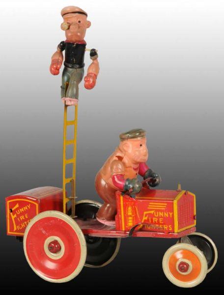 Appraisal: Marx Popeye Brutus Funny Fire Fighters Toy Auto Description Celluloid