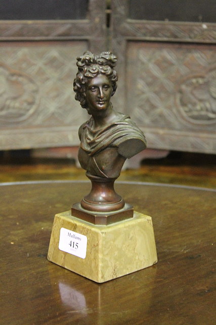 Appraisal: A BRONZE BUST of a classical figure by Eugene Bormel