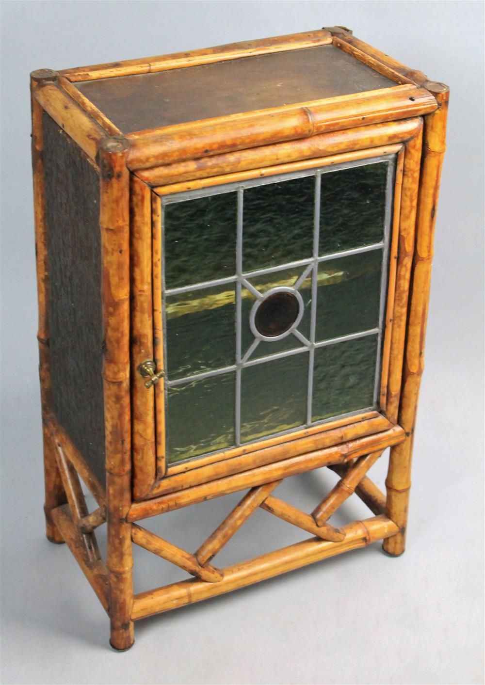 Appraisal: AESTHETIC MOVEMENT HANGING BAMBOO AND STAINED GLASS CABINET LINED WITH