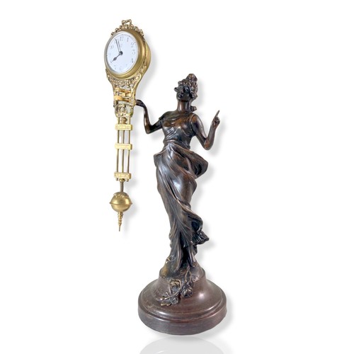 Appraisal: Early th Century Junghans mystery clock Spelter maiden holding aloft